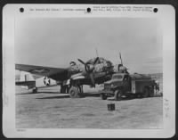 At an advanced Mediterranean Air Base, a captured JU-88 twin-engine bomber is refueled in preparation for its long flight to the United States. The plane was left virtually undamaged on an Italian airfield by the retreating Germans and was the first - Page 1
