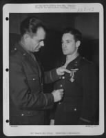 Capt. Thomas W. Ferebee of Mocksville, N.C., receives the Distinguished Flying Cross from Brig. General Joseph A. Atkinson. Italy. - Page 1