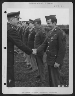 Consolidated > Sgt. Ernest I. Lipsett, 29 2nd St., Medforc, Mass., has been awarded the Distinguished Flying Cross for extraordinary achievement while participating in aerial flight in the Mediterranean Theatre of Operations as tail gunner by Maj. General Nathan F.