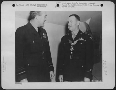 Consolidated > ITALY-Major General I.H. Edwards, deputy commander, Army Air Forces, Mediterranean Theatre of Operations, was decorated with the order of commander of the British empire at his Hdqts. Base in Italy on 15 Jan. 45. Air Marshal Sir John C. Slessor