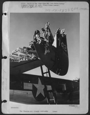 Consolidated > When They'Re Shot Up Its His Job To Get Them Fixed Up So Here Capt. Joseph W. Manske, 164 Commercial St., Gowanda Ny, Engineering Officer With A 12Th Af Billy Mitchell Squadron, Takes Stock Of The Damaged Suffered By This North American B-25 Bomber When A