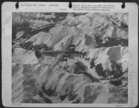 This Consolidated B-24 Liberator Bomber Of The 15Th Af Flies Over The Snow Covered Alps On Its Way To Attack An Enemy Target In Southern Germany.  Heavy Bombers Of The 15Th Af Penetrate Deep Into Southern Germany Cutting Rail Lines, Oil Supplies And Knock - Page 1