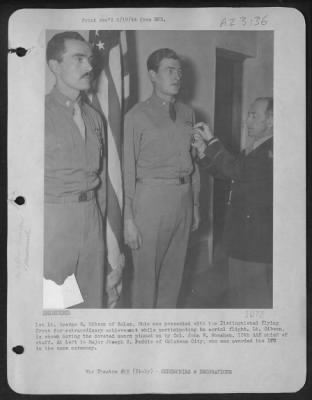 Consolidated > 1St Lt. George R. Gibson Of Salem, Ohio Was Presented With The Distinguished Flying Cross For Extraordinary Achievement While Participating In Aerial Flight.  Lt. Gibson, Is Shown Having The Coveted Award Pinned On By Colonel John W. Monahan, 12Th Aaf Chi