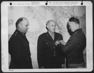 Consolidated > Major General John K. Cannon, Commanding General Of The 12Th Af, Being Decorated With The Distinguished Service Medal By Lt. Gen. Carl Spaatz, During Brief Ceremony At The Hdq. Of Lt. Gen. Ira C. Eaker'S Mediterranean Allied Air Forces.  Gen. Eaker Standi