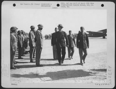 Consolidated > Capt. Eddie Richenbacker, Center, Reviews Troops Of The 94Th Fighter Squadron, 1St Fighter Group Somewhere In Italy.