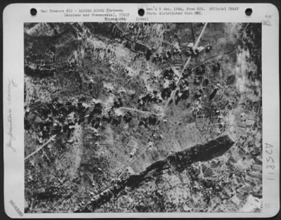 Consolidated > This picture, taken during an air attack on Sangro ridge positions, shows the pitiless bombing to which the German defenses have been subjected to in the last week. A string of bombs, shown in the center of the picture bursts among German defense