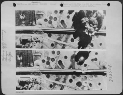 Thumbnail for Consolidated > Above, smoke mushrooms up over the Sassoula rail and road bridge in Northern Italy behind the Gothic Line as Martin B-26 Marauders of the Tactical Air Force hit the target. Below, the damage done by the Martin B-26 Marauders can be plainly seen on