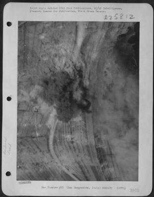 Thumbnail for Consolidated > Blocking the flow of supplies to Nazi troops in Italy, 12th Air Force Republic P-47 Thunderbolts strike daily at rail and road communications lines in bombing attacks like this one in a crater-marked narrows near San Margherita, Italy where highway