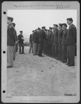 Consolidated > Brig. Gen. Robert D. Knapp awards medals, at Solenzara, Corsica, 1 February 1945.