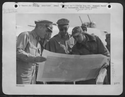 Consolidated > Left To Right: Major General Nathan Twining & Brig. Gen. Charles Born Are Shown Briefing Bombardier Lt. Robert V. Smith Of 704 Virginia Street, Charleston, Wv, Before The Lt. Takes Off On An Important Mission Over Southern France.