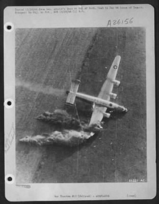 Consolidated > Dirt and flame spurt as flak-damaged 8th Air Force Consolidated B-24 Liberator plows into Holland field.