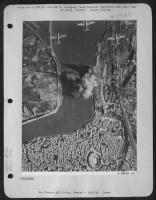 Thumbnail for Arles > USAAF Martin B-26 Marauders of the Tactical Air Force pass over their precision bombing pattern to score a perfect strike on the center of the railroad bridge across the Rhone River at Arles in Southern France, Nazi-held rail link.