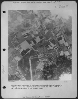 Caen > Reconnaissance Photograph Of The Caen/Carpiquet Airfield Of Damage To Buildings After The Raid That Took Place On 24 May 1944.  Caen Is In The Invasion Perimeter At The Present Time.
