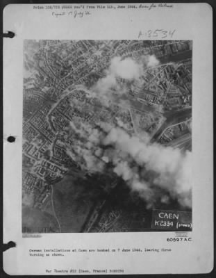 Caen > German Installations At Caen Are Bombed On 7 June 1944, Leaving Fires Burning As Shown.