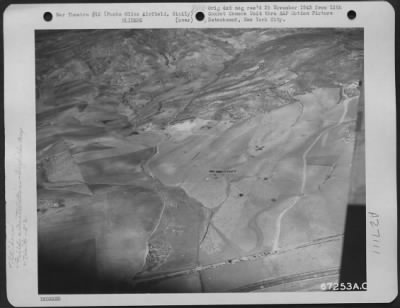 Thumbnail for Consolidated > Aerial view of Ponte Olivo Airfiel don which gliders of the 52nd Troop Carrier Wing landed. The gliders participated in maneuvers over Sicily in 1943.