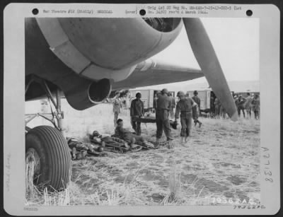 Thumbnail for Consolidated > American and Italian wounded at Agrigento, Sicily await evacuation by plane to Africa for further medical treatment. 25 July 1943.