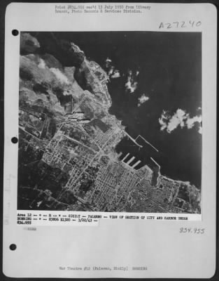 Thumbnail for Consolidated > Bombs descend on a section of the city and harbor of Palermo, Sicily, on 22 March 1943.