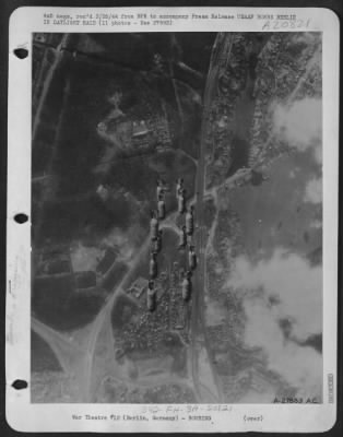 Consolidated > For the second time in three days, American bombs fall on the outlying factory area southwest of Berlin, as Liberators and Flying Fortresses of the U.S. Army 8th Air Force blast targets there.