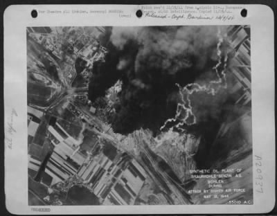 Consolidated > Synthetic oil plant of Braunkohle-Benzin A.G. at Bohlen, Germany, during attack by 8th Air Force, 12 May 1944.