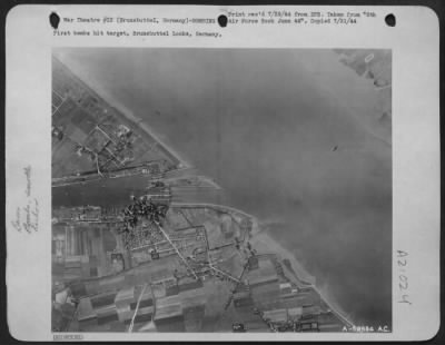 Consolidated > First bombs hit target, Brunsbuttel Locks, Germany.