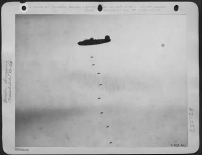 Consolidated > "Bombs Away" over Brunswick--U.S. 8th AAF heavy bombers, flying deep into Germany again 20 Jan 44 attack vital war industries at Brunswick and Hanover despite heavy clouds which made formation flying difficult. The great air battle-attack was