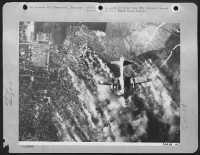 Consolidated > One of the 1250 heavy bombers sent over Germany 12/12/44 by the U.S. 8th Air Force, the Boeing B-17 Flying Fortress soars over the heavily bombed Darmstadt marshalling yards during a U.S. 8th Air Force attack on Nazi traffic centers supplying the