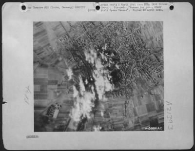 Consolidated > GOTHA ATTACK---Concentration of bombs from U.S. 8th AF Boeing B-17 Flying Fortresses burst on and around the Gotha marshalling yards during yesterday's 6 Feb. 1945 attack by the First Air Division.