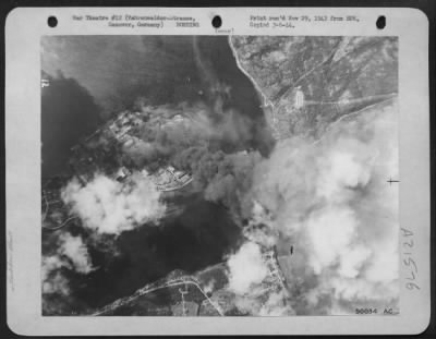 Consolidated > THE FACTORY FRONT GETS IT: The thunderous RAF night raids, led to their targets by pathfinders, hammered whole industrial areas inside Germany; by contrast, the "Flying Fortresses," with their accurate bombsights, picked out single factories, wrecked