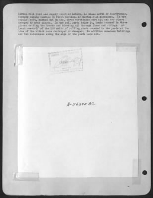 Thumbnail for Consolidated > German rail yard and supply depot at Lebach, 12 miles north of Saarbrucken, Germany during bombing by First Tactical AF Martin B-26 Marauders. In the supply depot, marked out on top, three warehouses were hit and two others damaged by near misses. In