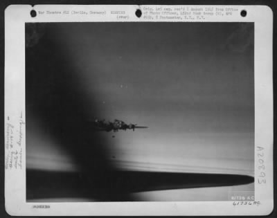 Thumbnail for Consolidated > With Bomb Bay Doors Open, Boeing B-17 Flying Fortresses Of The 452Nd Bomb Group Sends Its Bomb Plummeting Earthward Toward Berlin, Germany, 9 March 1944.  Heavy Bombers Of The 8Th Air Force Continually Blasted As Every Operational Enemy Factory, Oil Refin