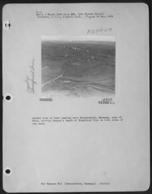 Consolidated > Aerial View Of Road Leading Into Brandscheid, Germany, West Of Prum, Showing Dragon'S Teeth Of Siegfried Line On Both Sides Of The Road.