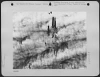 Bombs Follow The Target Marker As They Descend Toward Nazi Installations At Bremen, Germany.  16 Dec. 1943. - Page 1