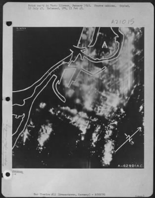 Consolidated > Bombing Of Bremerhaven, Germany, On The Night Of 18-19Th Sept. 1944.  Photo Was Taken Soon After The End Of The Attack And Shows The Entire Southern Half Of The Town On Fire. The Streets And Docks Are Seen Outlines By The Fire.  The White Line Has Been Dr