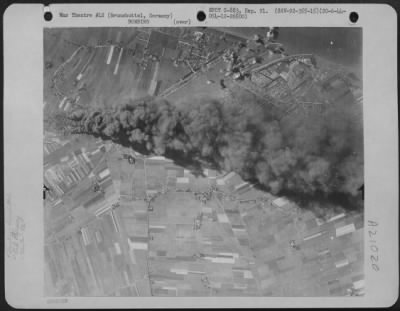 Consolidated > Bombs Dropped By Planes Of The 92Nd Bombardment Group, 8Th Af On 20 June 1944 Wreak Destruction On The Locks And Oil Facilities At Brunsbuttel, Germany.