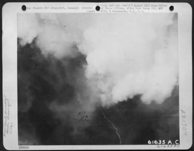 Consolidated > Following The Same Path As The 'Marker' Bomb, High Explsoives Dropped By Boeing B-17 Flying Fortresses Of The 452Nd Bomb Group Cascade Into A Dense Layer Of Clouds Over The Target, Frankfurt, Germany, On 20 March 1944.  The Bomber Formation Remained Above