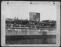Hamburg Germany -- Namesake Of Robert Ley, The Nazi Labor Camp Front Leader Now A Prisoner Of The Allied Armies, Is The 28,000-Ton Liner Built In 1938 For The 'Strength Through Joy' Movement Cruises.  It Was Gutted By Fire As A Result Of One Of The Attack - Page 1
