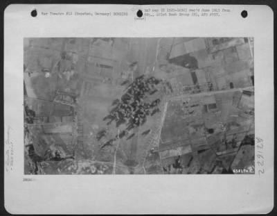 Consolidated > Bombs Dropped By Boeing B-17 Flying Fortresses Of 401St Bomb Group Explode On The Target Of The Day - An Airfield Near Hopsten, Germany, 27 April 1945.