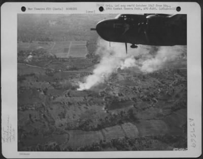 Consolidated > The North American B-25 'Erotic Edna' Of The 1St Air Commando Force Places A Direct Hit On A Bridge Approaching Imphal Valley In India.