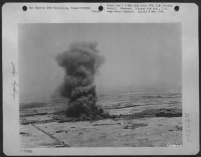 Consolidated > The Japanese Troop And Supply Area At Thitielon South Of Pyinmane, Burma, Goes Up In Smoke After North American B-25 Mitchells Medium Bombers Of The Bomb Group, Eastern Air Command, Saturated The Town With Incendiary And Frag Bombs.