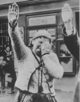 Sudeten woman unable to conceal misery salutes Hitler 1943.jpg