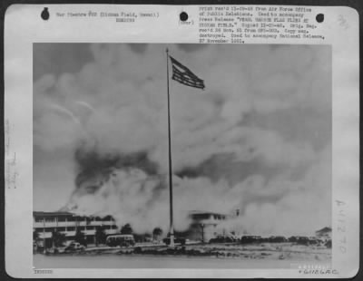 Consolidated > Pearl Harbor Flag Flies At Hickam Field -- The Garrison Flag, Pictures, Which Flew Over Hickam Field, Hawaii, On December 7, 1941 At The Time Of The Japanese Attack, Was Raised Again At 7:55 Am Today (Hawaii Time) In Special Ceremonies At The Hawaiian Bas