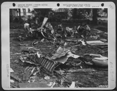 Thumbnail for Consolidated > First Army Photos Of The Bombing Of Hickam Field, Hawaii, Dec. 7, 1941.  Wreckage Of Japanese Plane Shot Down Near Ccc Camp In Wahiawa, T.H.