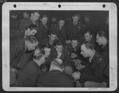 Thumbnail for Groups > Lt. Gen. James Doolittle And Lt. Gen. Carl Spatz, Backs To Camera, In An Informal Discussion With Air Forces Men Of A Unit Which Has Just Completed Its 100Th Mission In The Eto.