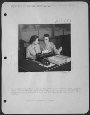 Thumbnail for Consolidated > In Administrative Offices Of The Air Transport Command In Hawaii, S/Sgt. Charles S. Moore, 805 West Broadway, Eagle Grove, Iowa, Turns His Desk And Duties Over To Wac Cpl. Mildred W. Runyon Of Holden, West Virginia.  The Wacs Are The First In The Pacific.