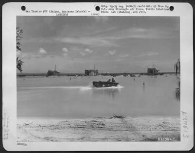Consolidated > Unloading Equipment From Three Lst (Landing Ship Tanks) During Landing Operations On Saipan, Marianas Islands, June 21, 1944.