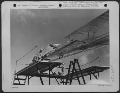 Thumbnail for Consolidated > Sheet Metal Wokers Repair Wing Of A Boeing B-29 "Superfortress" Which Was Hit During The First Bombing Mission Over Tokyo, Japan.  Saipan, Marianas Islands.  November 1944.