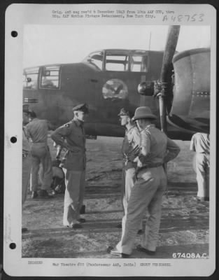 Groups > Colonel Conrad F. Necrason Of The 7Th Bomb Group, Stationed At Pandaveswar Army Air Base In India, Welcomes Brig. General Howard C. Davidson For An Inspection Tour Of The Base.  1943.