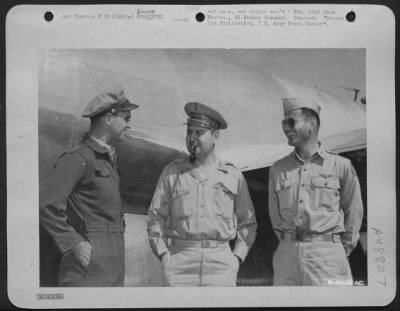 Groups > India - Major General Curtis E. Lemay (Center) Is Pictured With Pilot And Co-Pilot Who Flew Him From India To The Marianas In A Boeing B-29 Superfortress.  Left Is Major Renato Simoni, San Jose, Calif., Co-Pilot; And At His Right Is Capt. Robert Berman, O