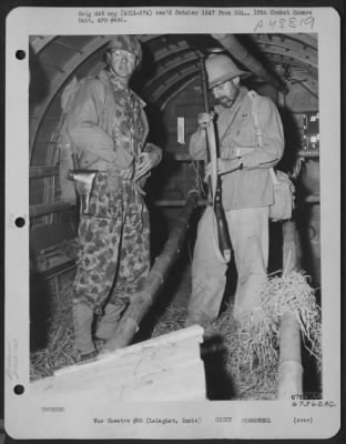 Thumbnail for Groups > Major General Orde Charles Wingate, Accompanied By An American Aide, Examines His Rifle Before Taking Off In A Douglass C-47 From Lalaghat, India.