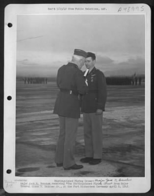 Groups > Distinguished Flying Cross - Major Jack N. Donohew [:] Major Jack N. Donohew Receiving 'The Distinguished Flying Cross' From Major General Simon B. Buckner Jr., At The Fort Richardson Ceremony April 8, 1942.